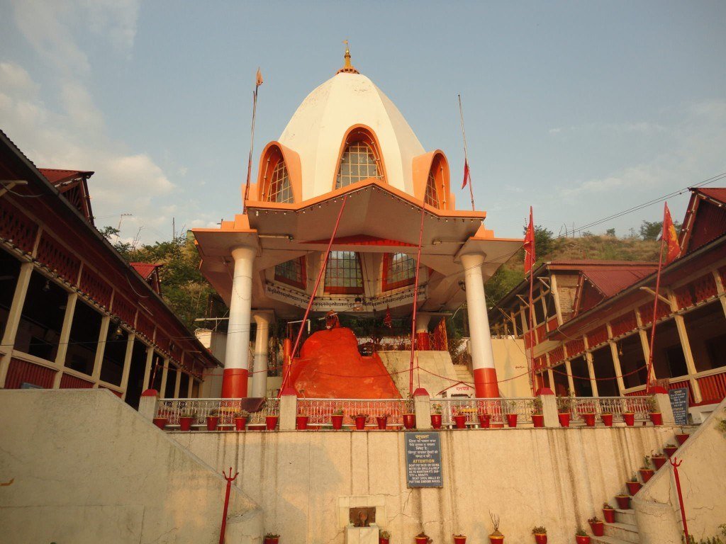 Temple shrine with orange sacred rock